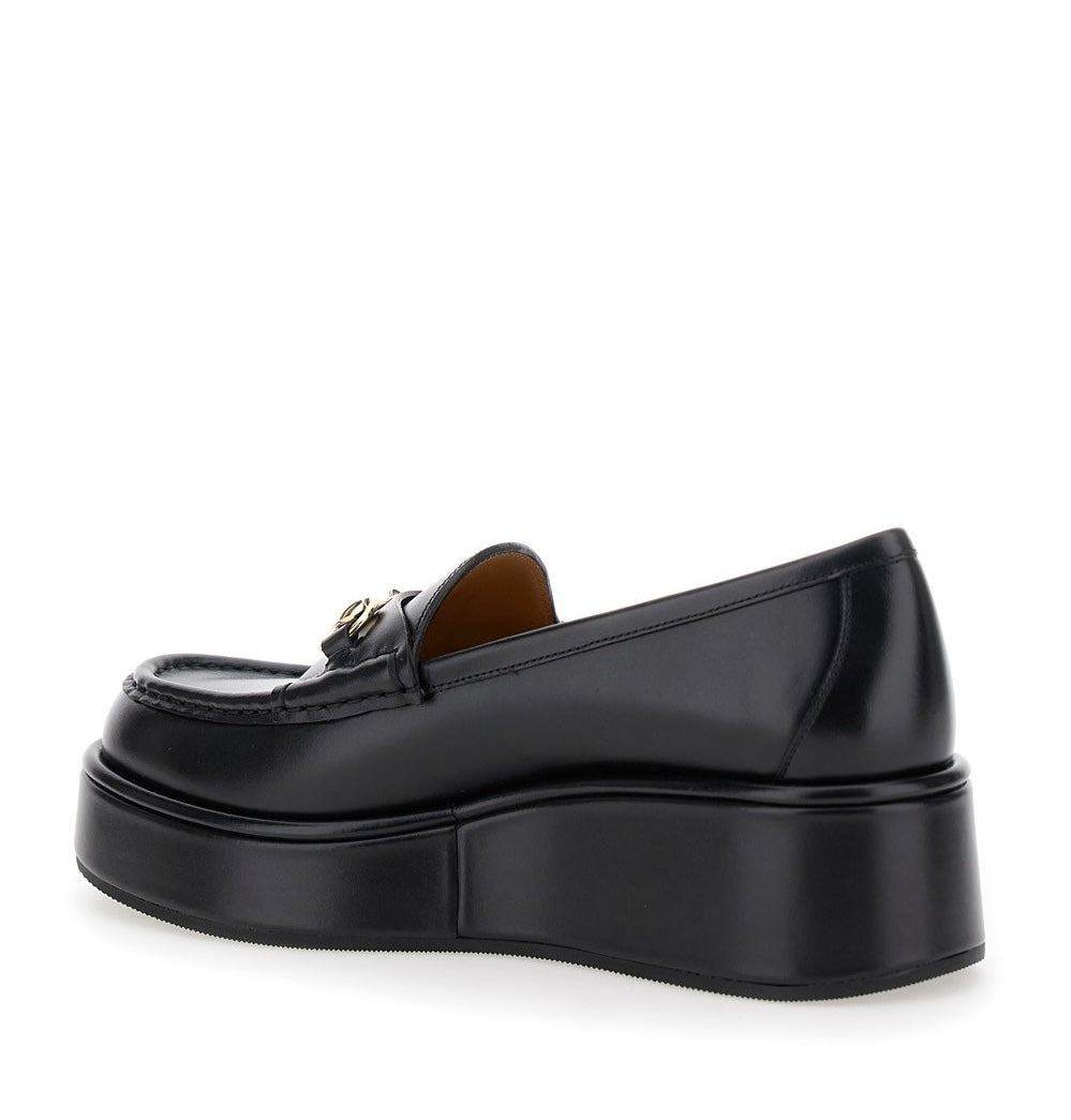 Gucci women’s horsebit wedge loafers