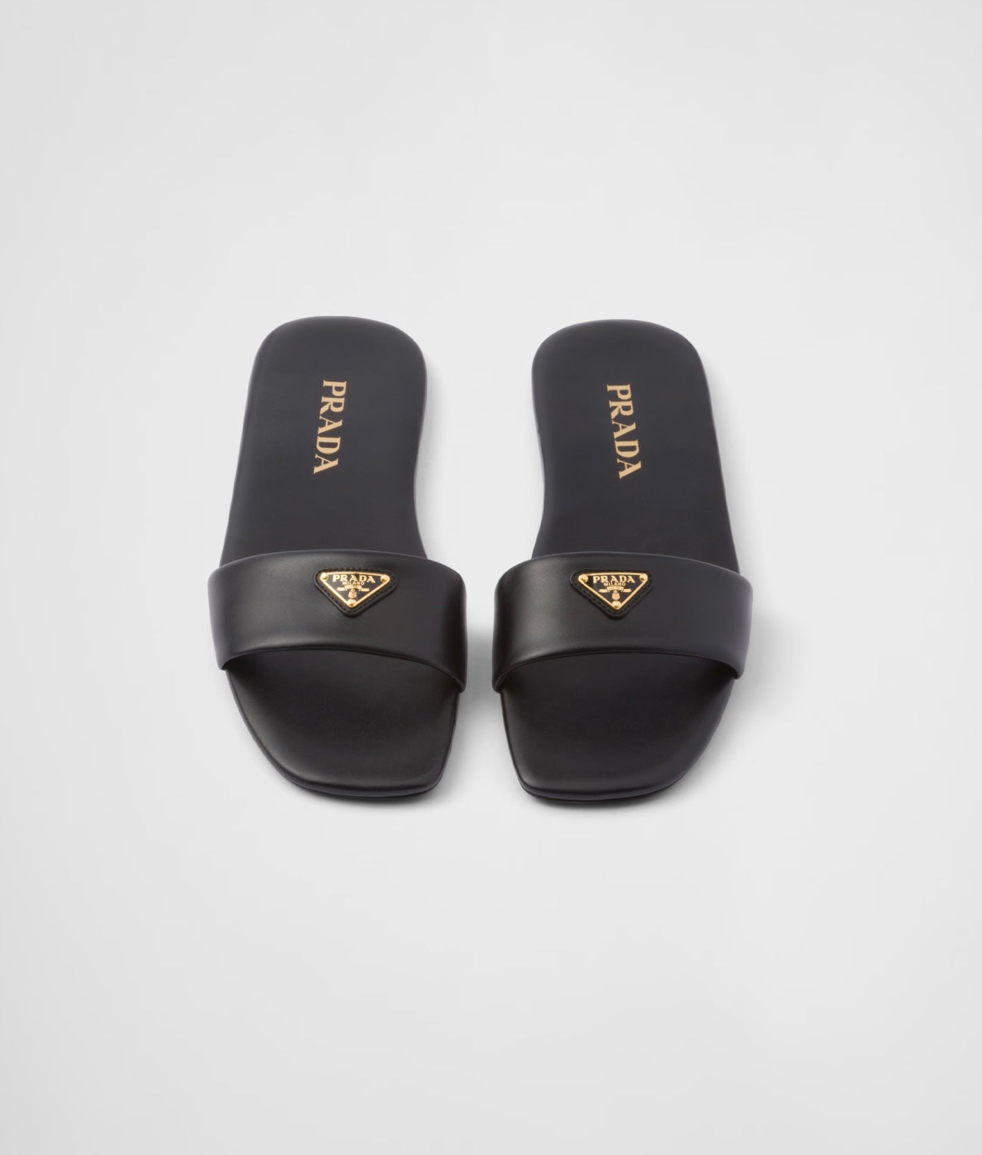 PRADA black leather slides